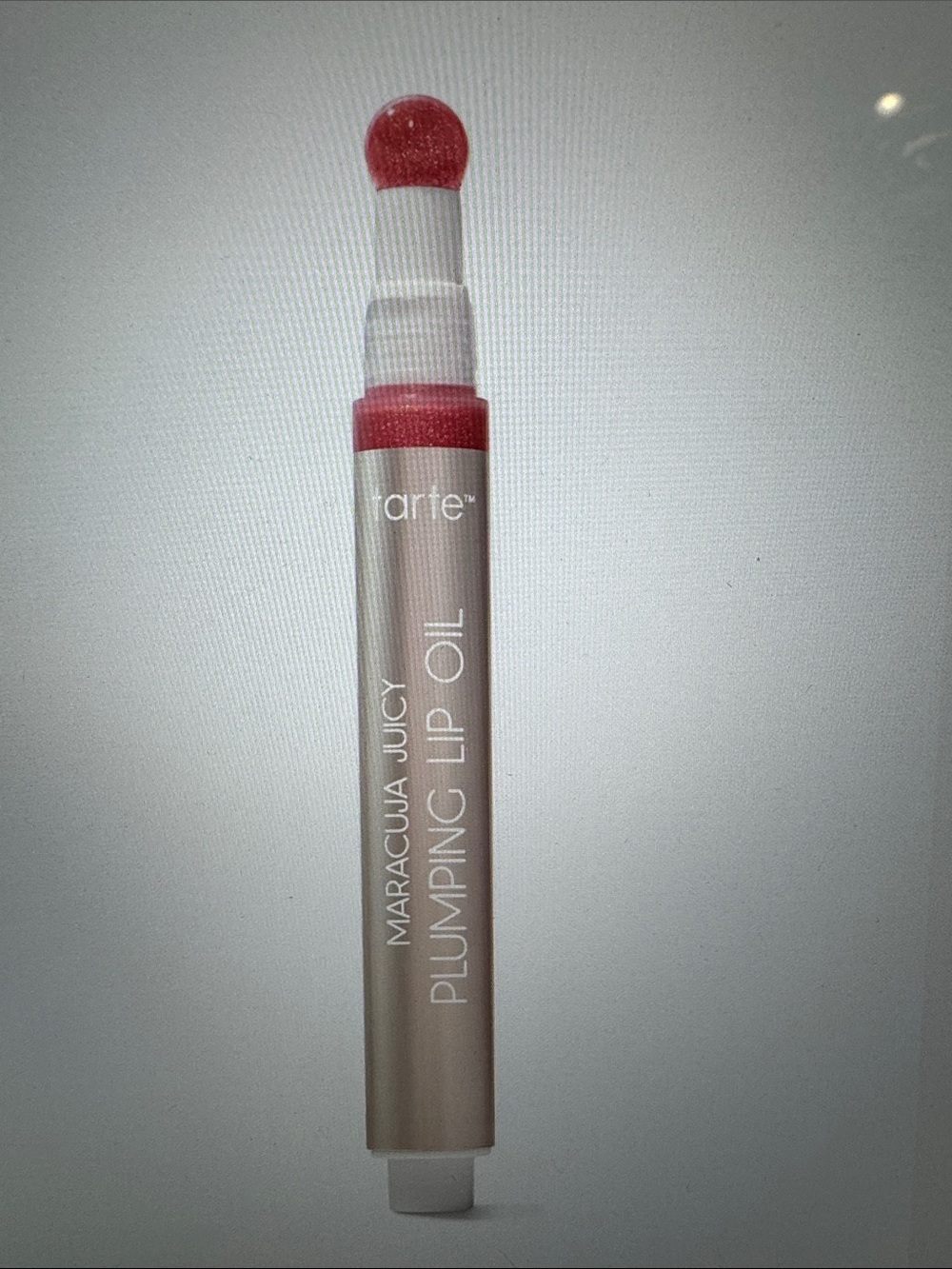 maracuja juicy plumping lip oil Petunia